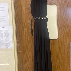 Elegant Black Sleeveless Dress with Embellished Waist